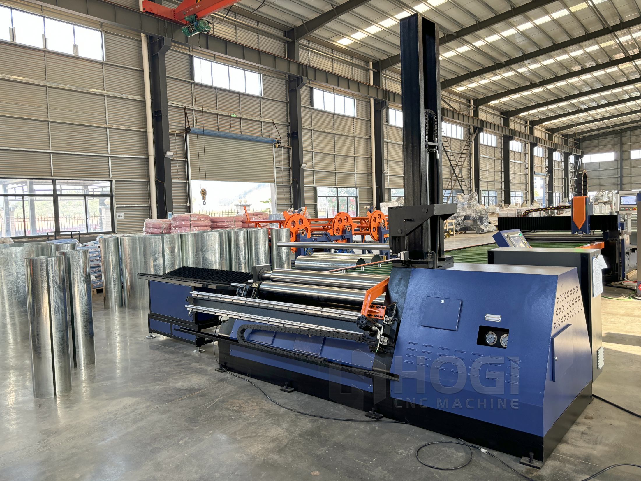4 roller plate rolling machine in a fabrication workshop