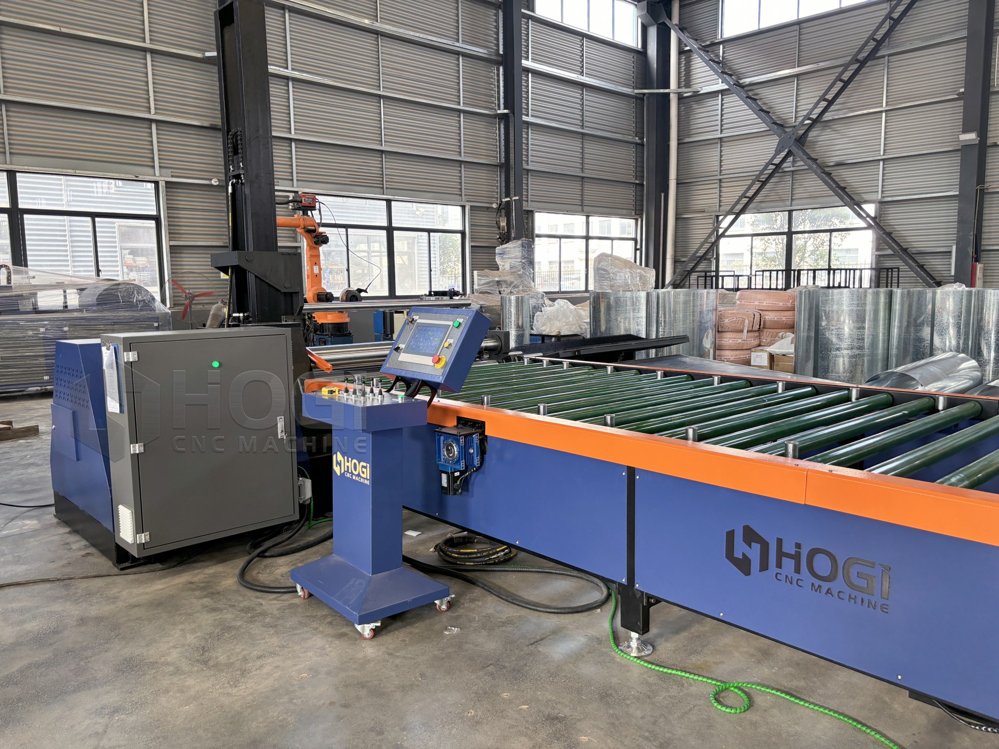 4 roller plate rolling machine in a fabrication workshop