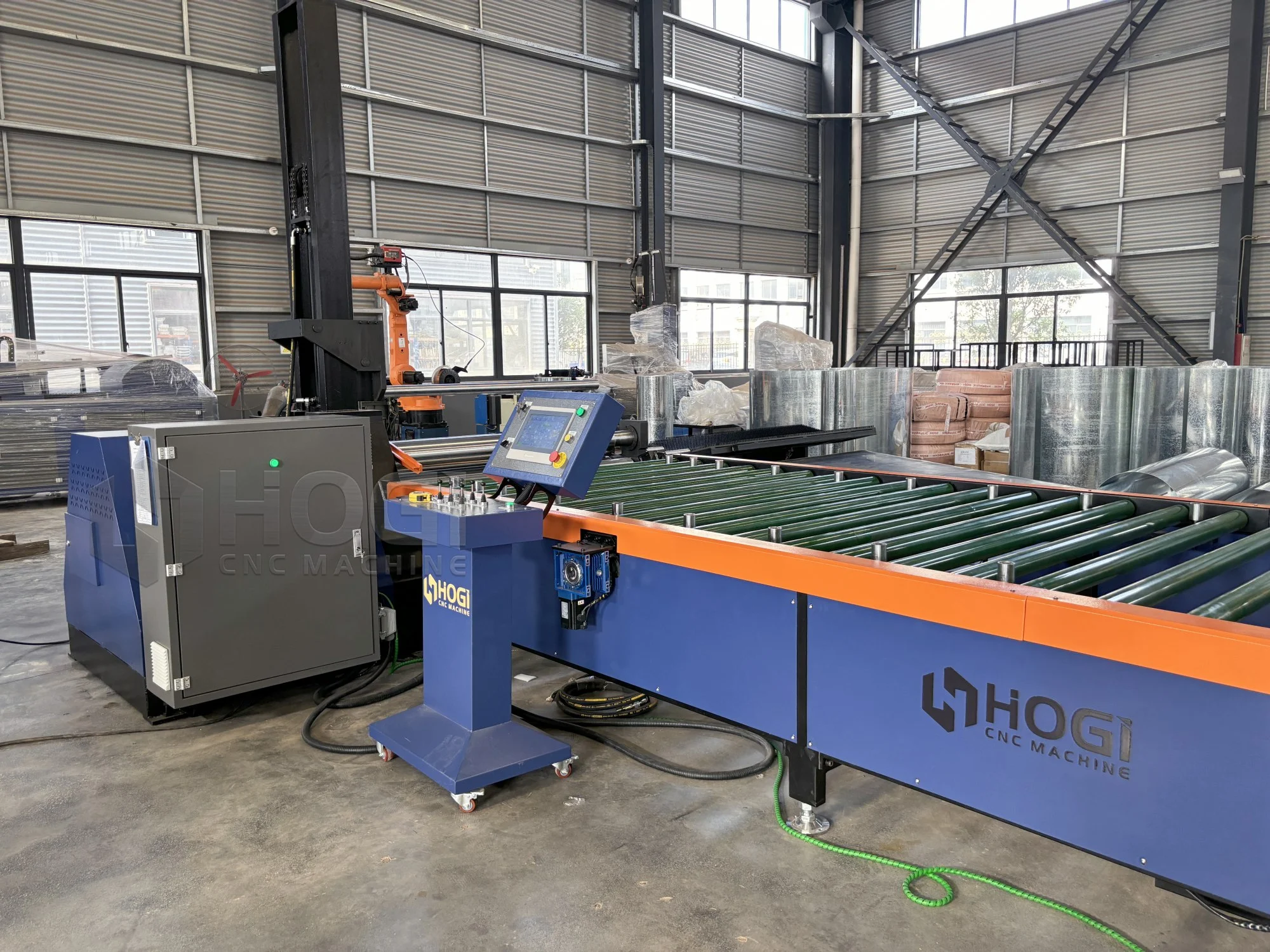 4 roller plate rolling machine in a fabrication workshop